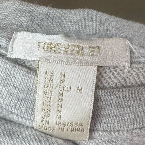 Forever 21 sweatshirt. Gray with the word “HONEY” in golden yellow.  Medium - Picture 4 of 6